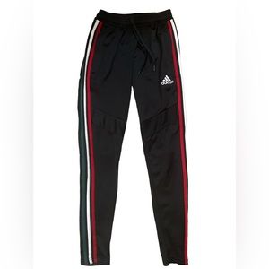 Black 3-stripe adidas trackpants